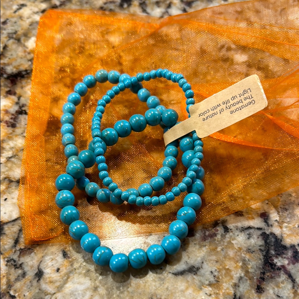 Turquoise Beaded Bracelet Set Of Three Graduating Sizes.